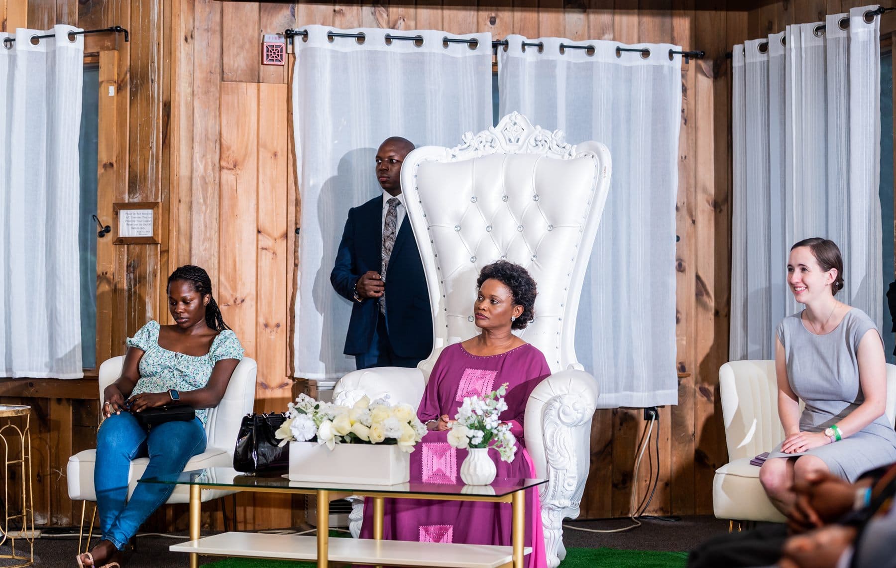 Her Royal Highness seated in conversation with young people during the fireside session