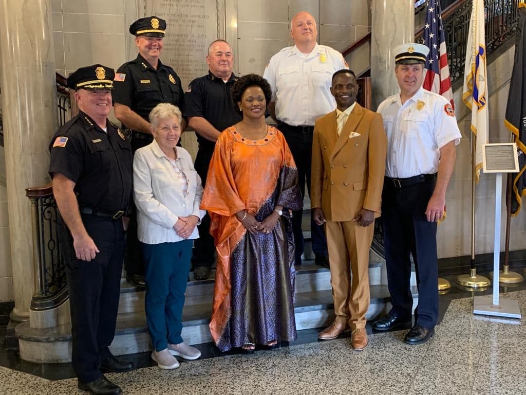 Waltham Mayor Jeannette A. McCarthy, Her Royal Highness the Nnaabagereka, Prince Henry Edward Ssuuna and local public-safety leaders gathered in Waltham