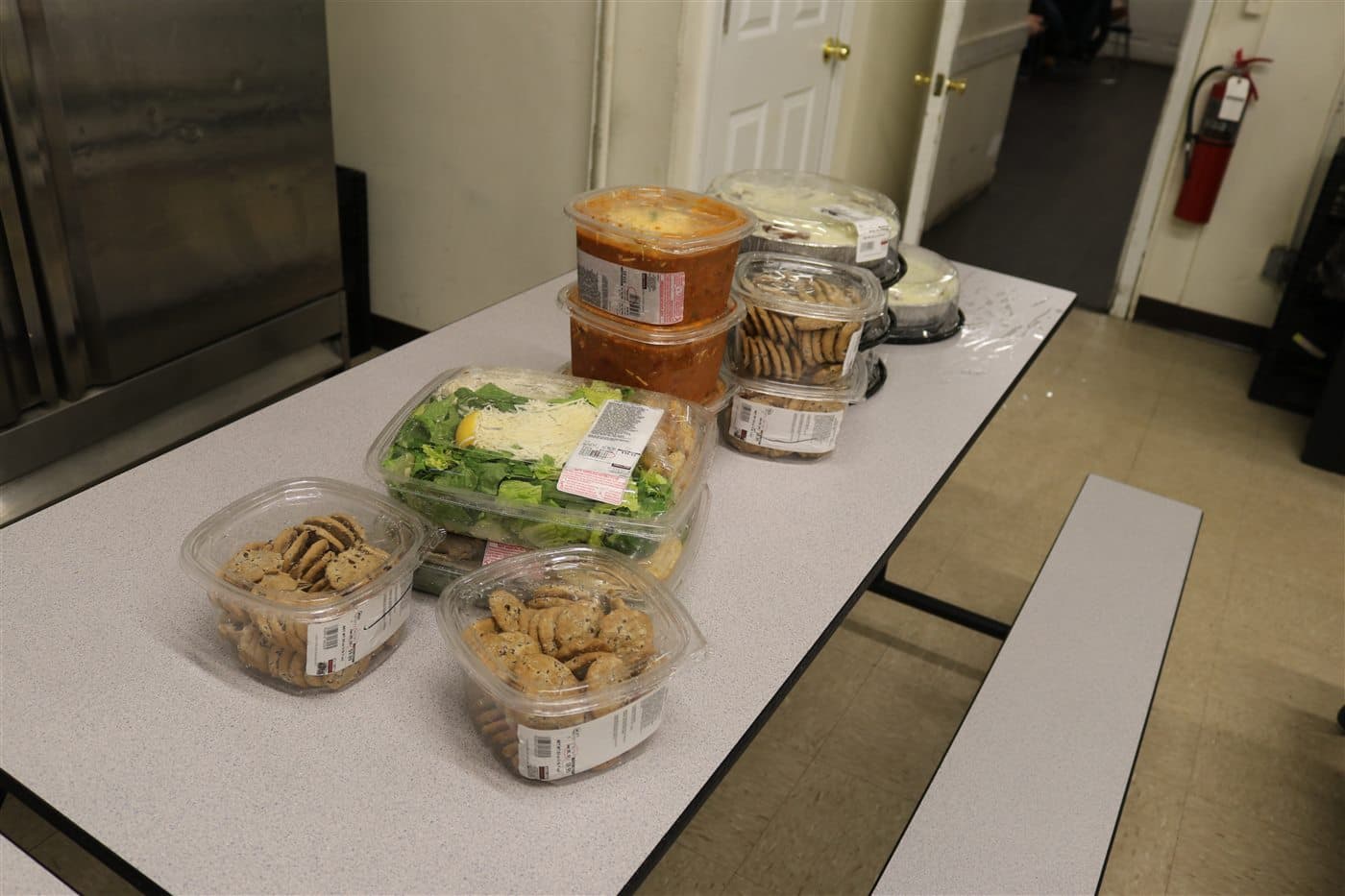 Salads, soups and baked goods arranged for outreach