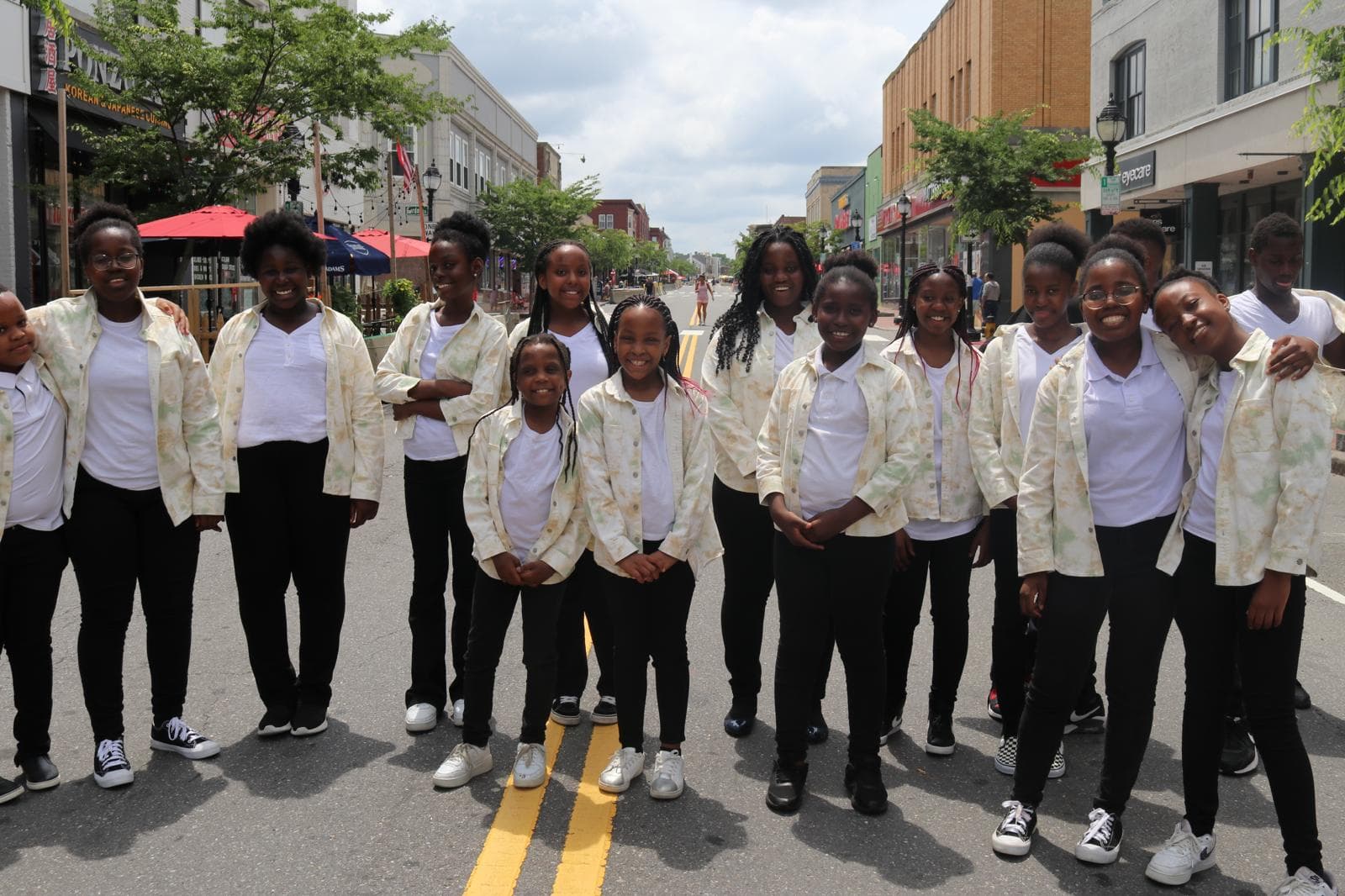 A group of young people gathered together during community outreach