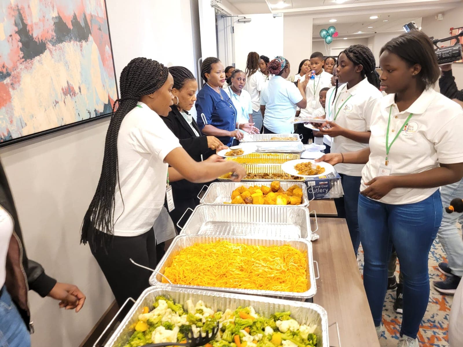 Young people sharing a meal at an HESM gathering